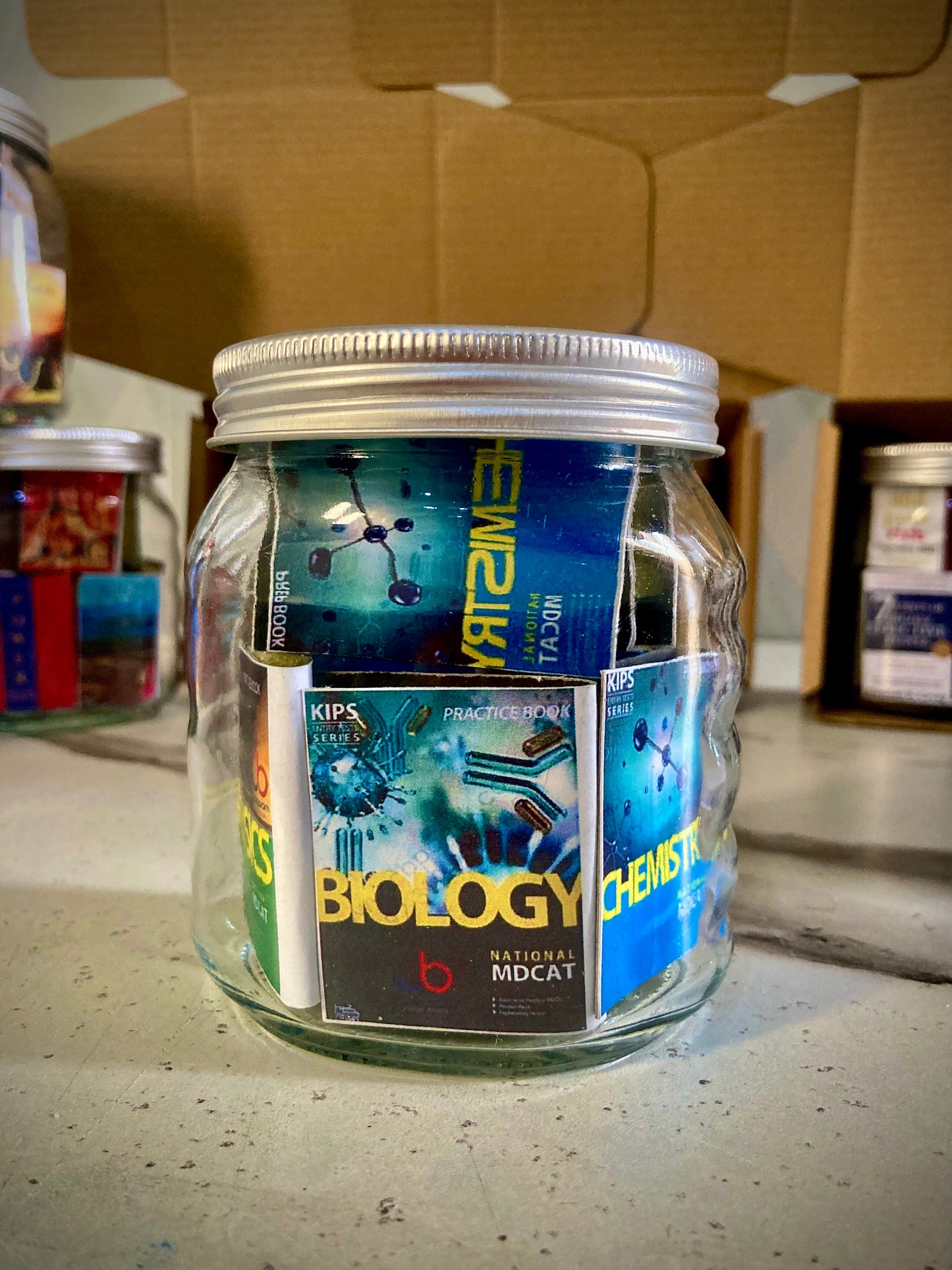 MINIATURE NOVEL GLASS JAR(with MDCAT BOOKS)